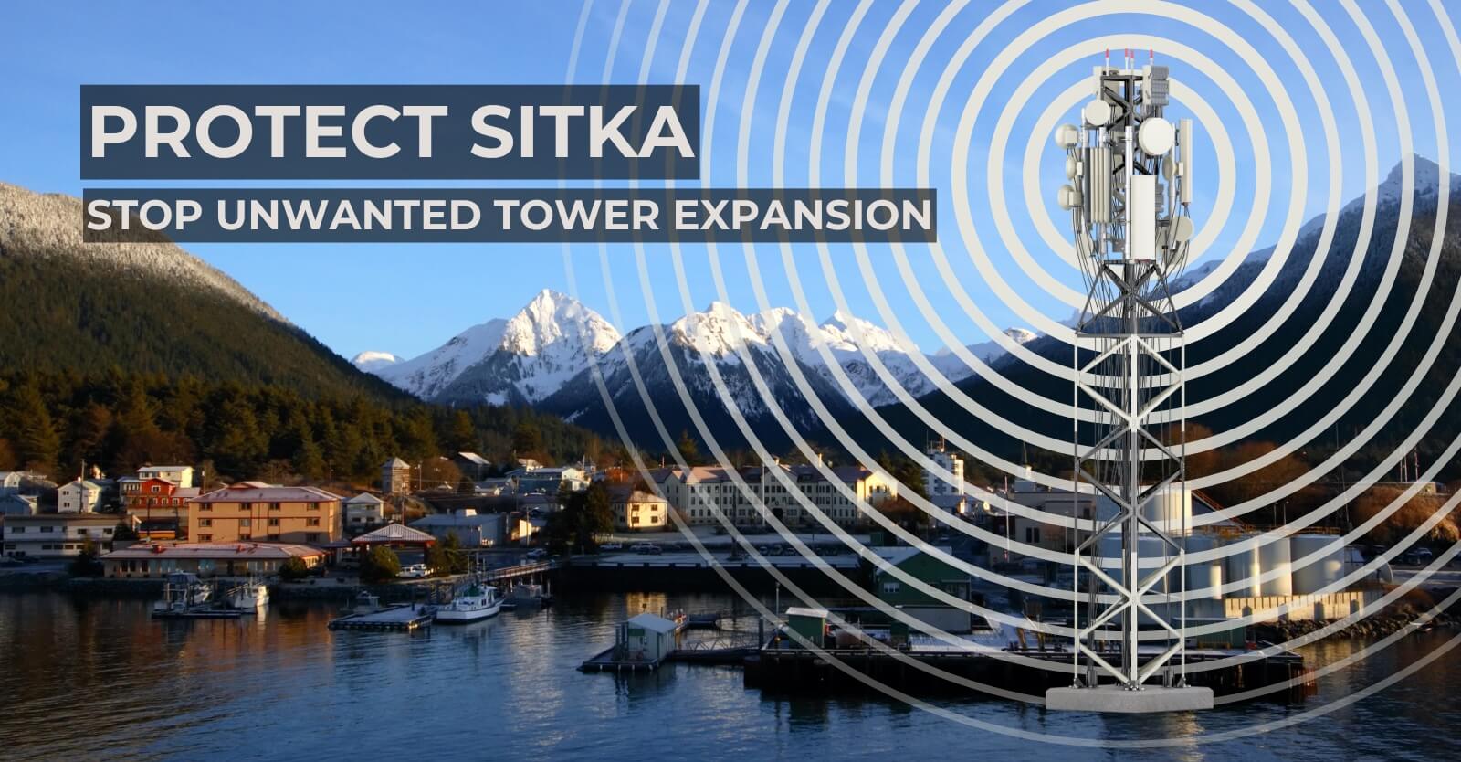view of Sitka, Alaska with mountains in the background and a radio tower in the foreground