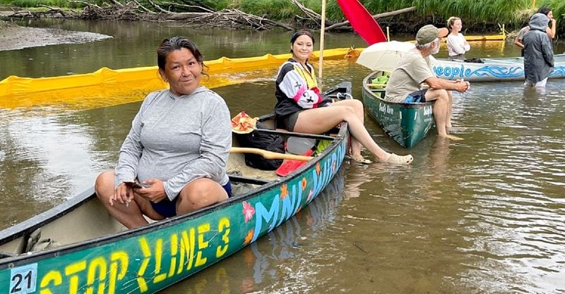 Water protectors in the area of Willow River where Enbridge is working to install a "climate-wrecking" tar sands pipeline.