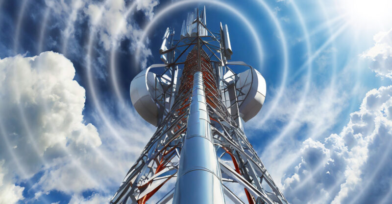 photo of wireless tower from below agains a cloudy sky overlaid with a circular wave pattern