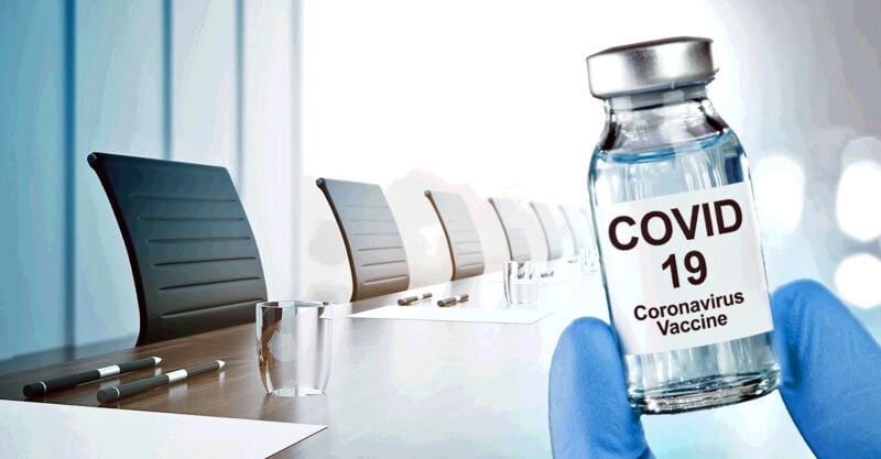 meeting room with covid vaccine on right