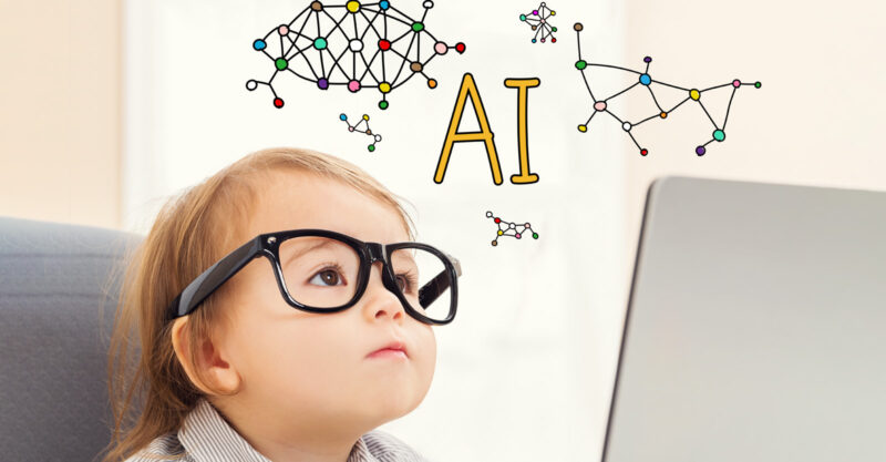 AI text with toddler girl using her laptop