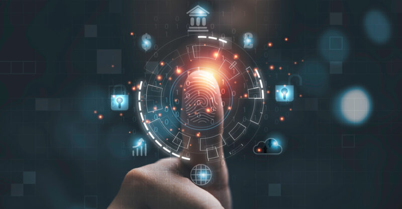 Man using thumb to scan finger print or for digital processing biometric identification to access security system includes internet banking, cloud system and mobile phone