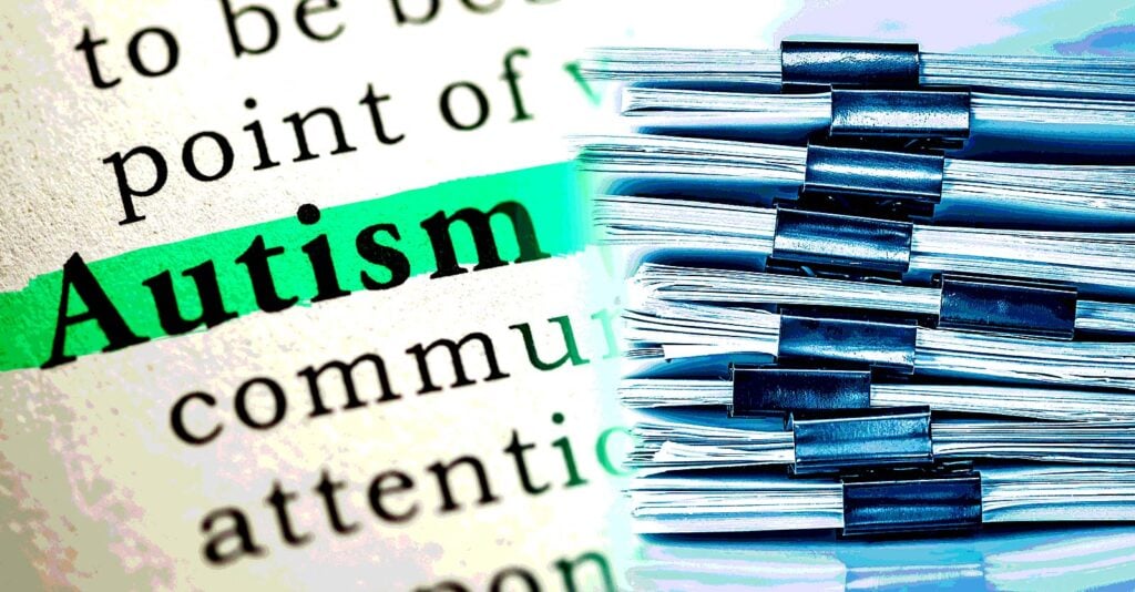 stack of files and word "autism"