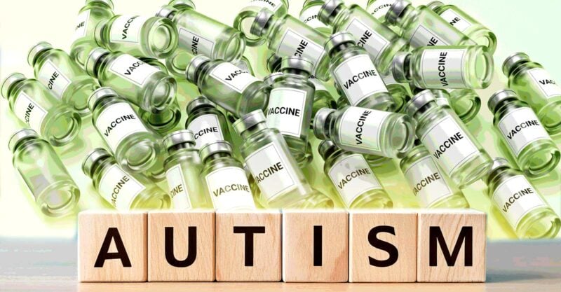vaccine bottles and word "autism"