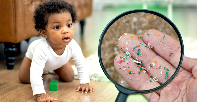 baby crawling and hand holding microplastics inside magnifying glass