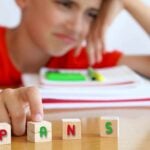 boy and letters "pans"