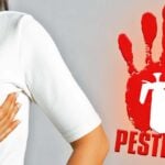 woman checking for lump and pesticide sign