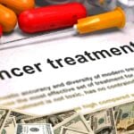 money and words "Cancer treatment"