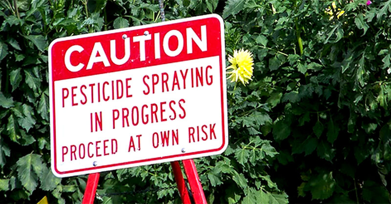 caution pesticide sign feature