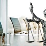 meeting table and lady justice