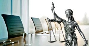 meeting table and lady justice