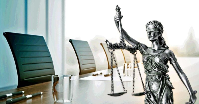 meeting table and lady justice