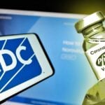 cdc logo and pfizer covid vaccine bottle