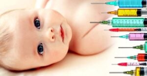 baby and vaccine syringes