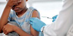 child getting vaccine in arm