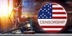lady justice, gavel and american flag button with word "censorship" on it
