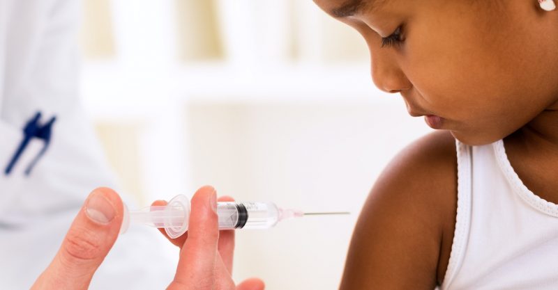 Child receiving vaccine
