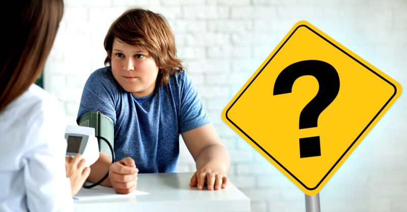 boy getting blood pressure checked