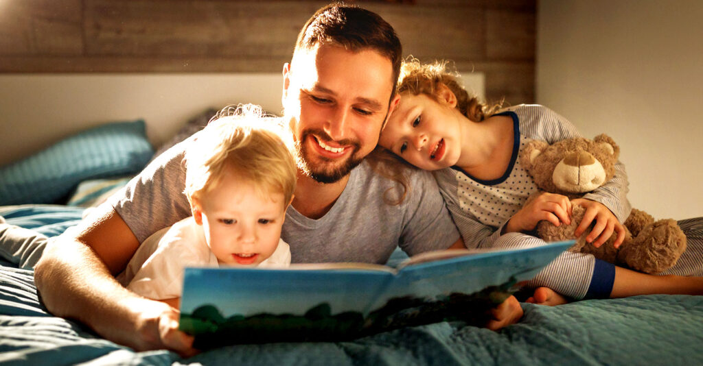 dad reading to kids