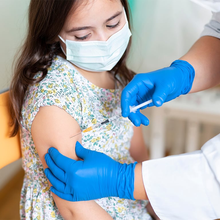 Child getting vaccinated.