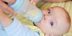 baby drinking from bottle