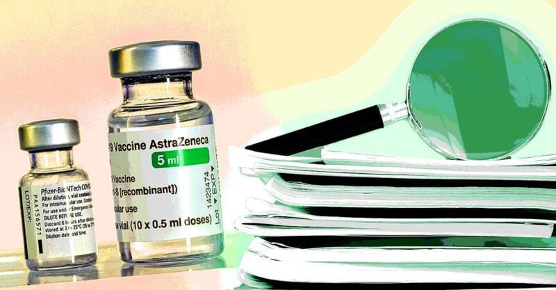 pfizer and astrazeneca covid vaccines and stack of papers