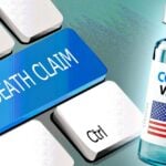 death claim on keyboard and covid vaccine bottle