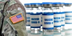 u.s. military uniform and covid vaccine bottle