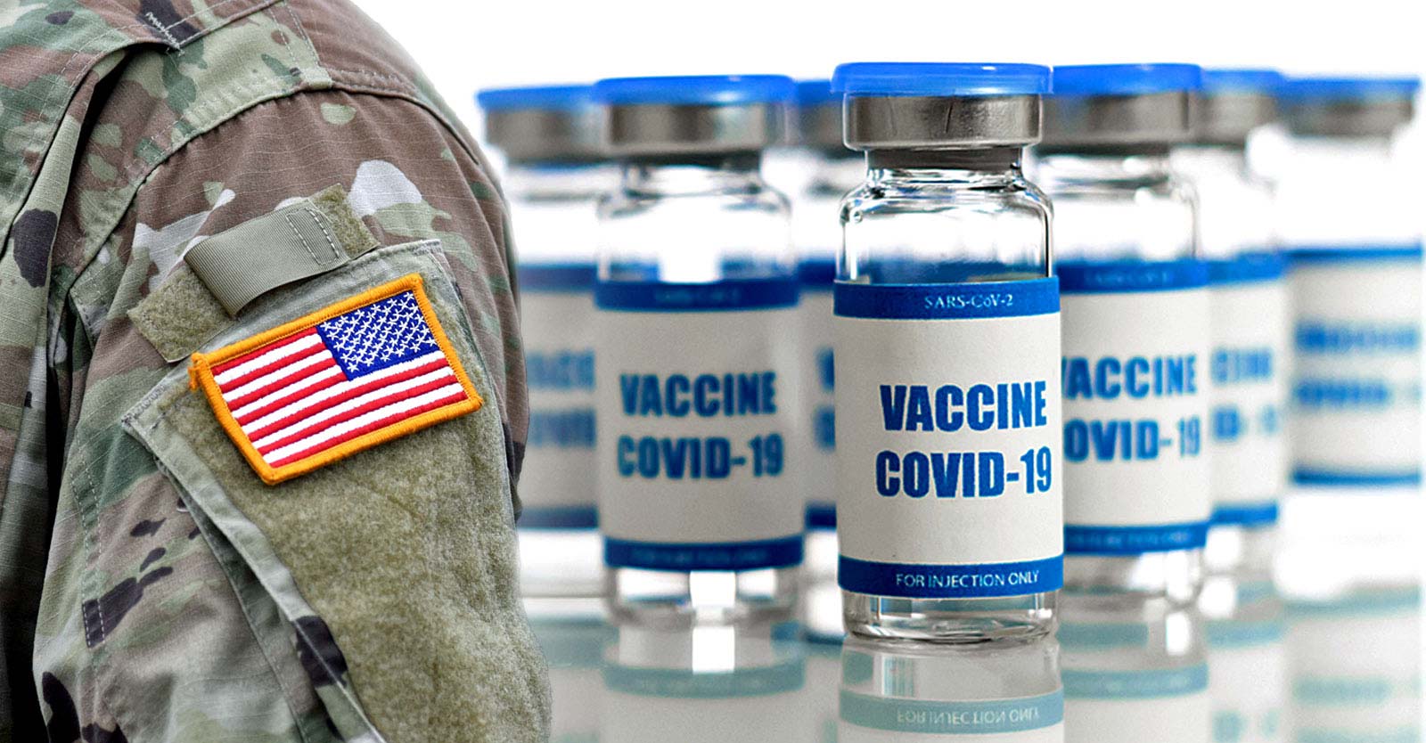 u.s. military uniform and covid vaccine bottle