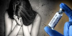woman and covid vaccine bottle