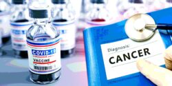 covid vaccines and cancer written on a folder