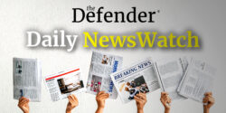 hands holding newspapers and words "The Defender Daily NewsWatch"