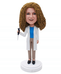 Bobble head doctor with syringe