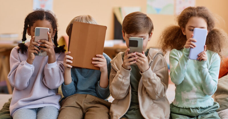 Children using Mobile devices