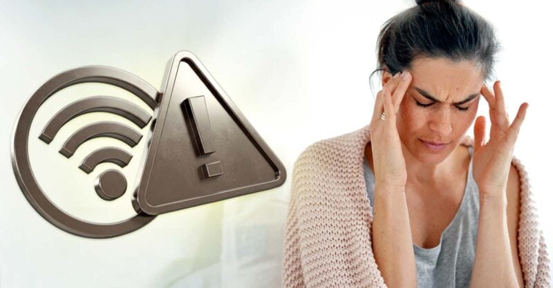 woman holding her head in pain and wireless radiation symbol