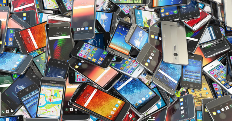 Large pile of smart phones.