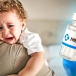 toddler and merck vaccine bottle