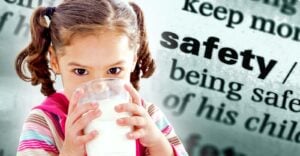 child drinking milk and word "safety"
