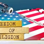 united states and vaccine bottle with words "freedom of religion"