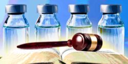 vaccine bottles and gavel