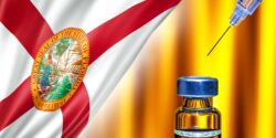 florida flag and vaccine bottle