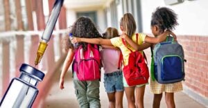 school kids and vaccine bottle