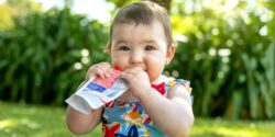 baby eating fruit pouch