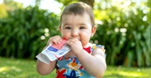 baby eating fruit pouch