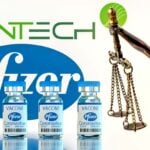 BioNTech Pfizer COVID-19 vaccine bottles and Lady Justice