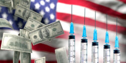 united states flag, money and vaccine syringes
