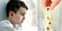 boy staring out window and word "plan"