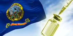 idaho flag and vaccine bottle