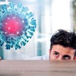 man looking at spike protein virus