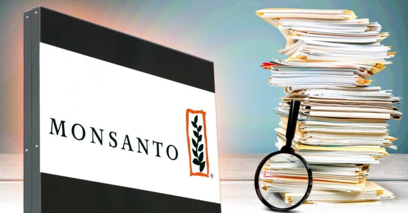 monsanto logo and stack of papers